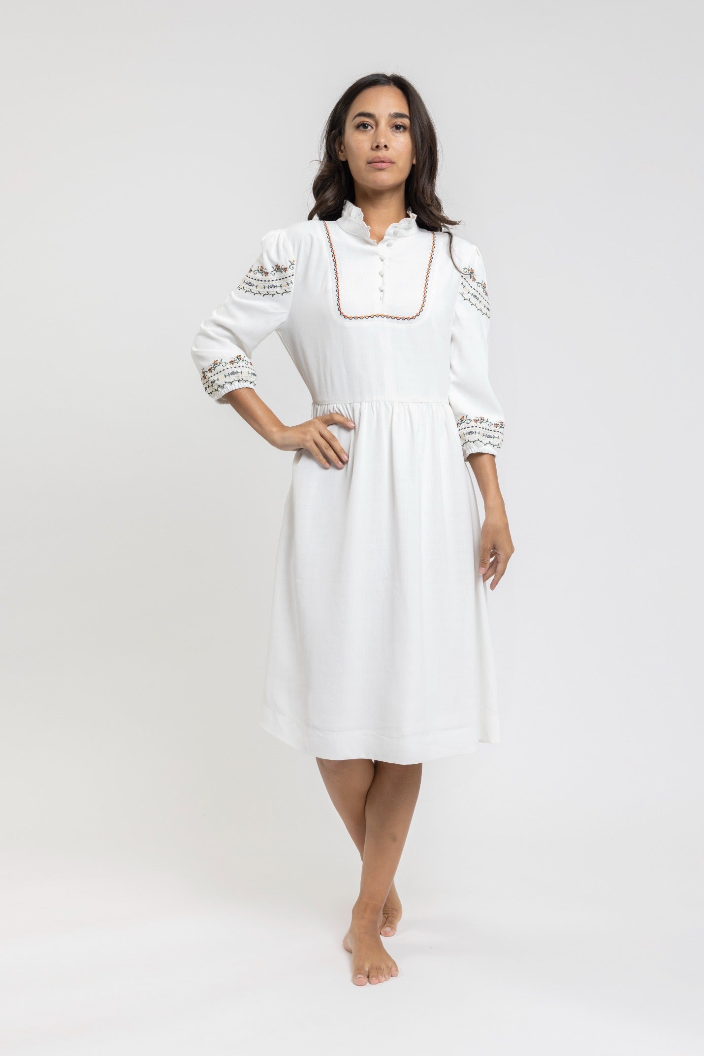 White Dress With Ruffle Collar Bib Embroidery And Floral Embroidery On The Sleeves